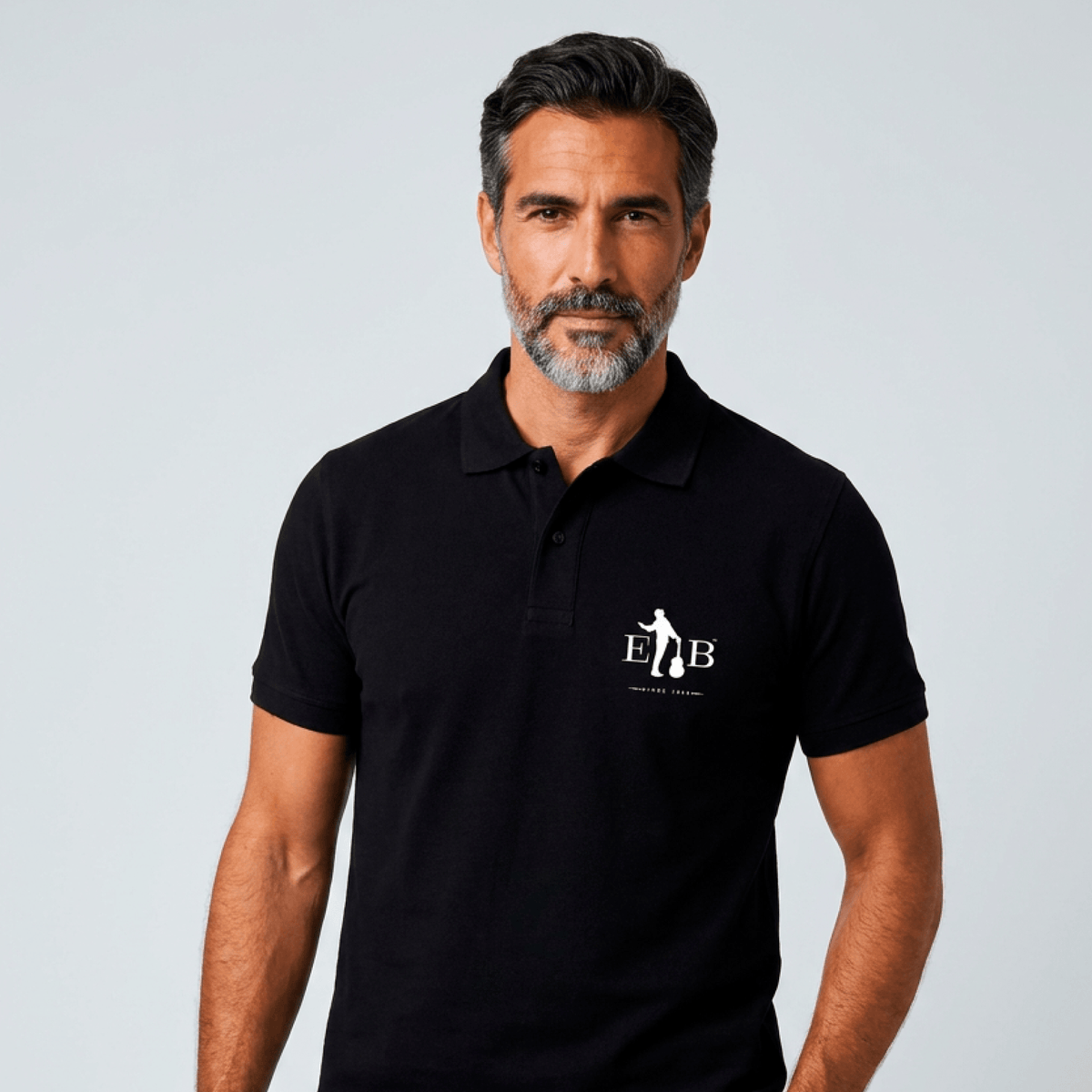 El Barrio - Polo Unisex Negro "Logotipo" Bordado - D2fy - Direct To Fans - El Barrio